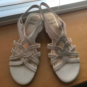 Small wedge white sandals.